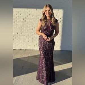 Elegant Betsy & Adam plum lace evening gown with sheer neckline — size 8